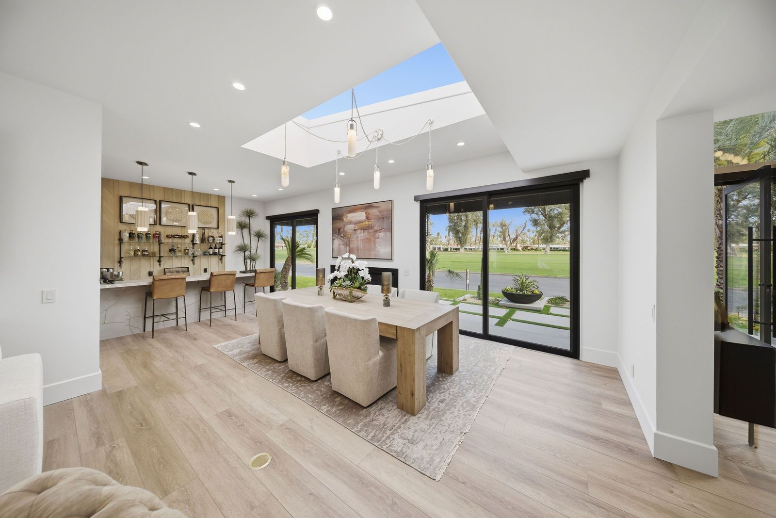 Desert-modern home at 77013 Desi Dr, Indian Wells — photographed for The Chavez Team at The Agency — dining room under the skylight