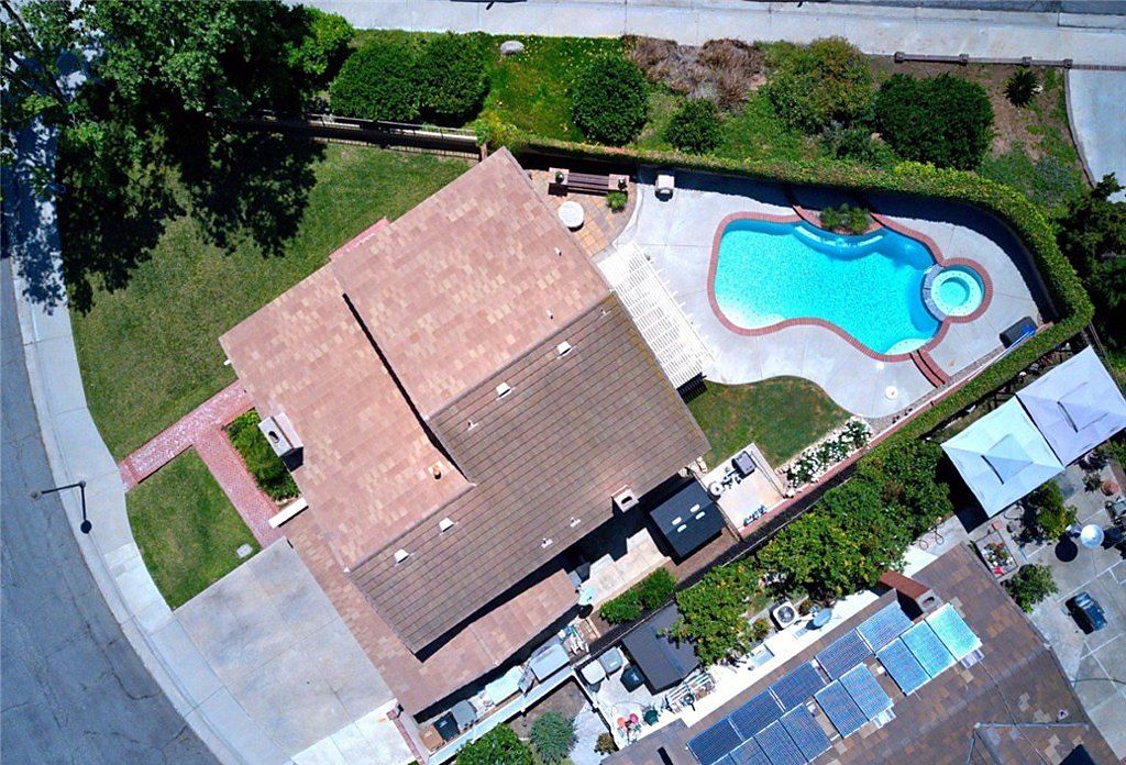 Aerial view of a single-story Brea home with a backyard pool on a cul-de-sac, sold by The Chavez Team