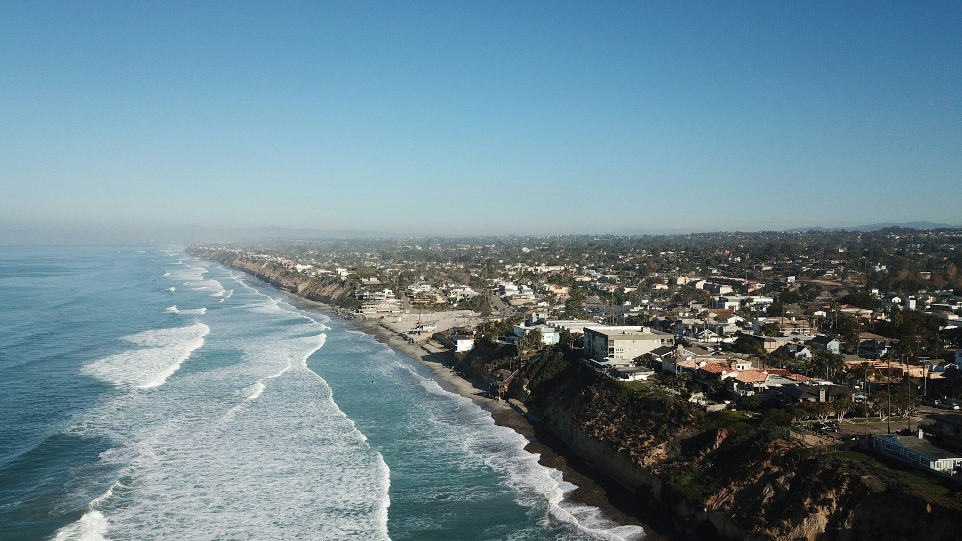 Aerial view of the coastal village, beach and open sea at Encinitas, California